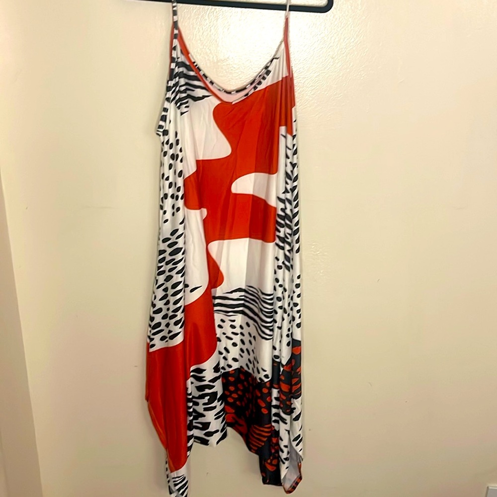 Harem pant jumpsuit. Black, white, and red geometric pattern. Plus size.